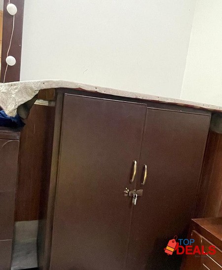 Iron table with attached cupboard image 1